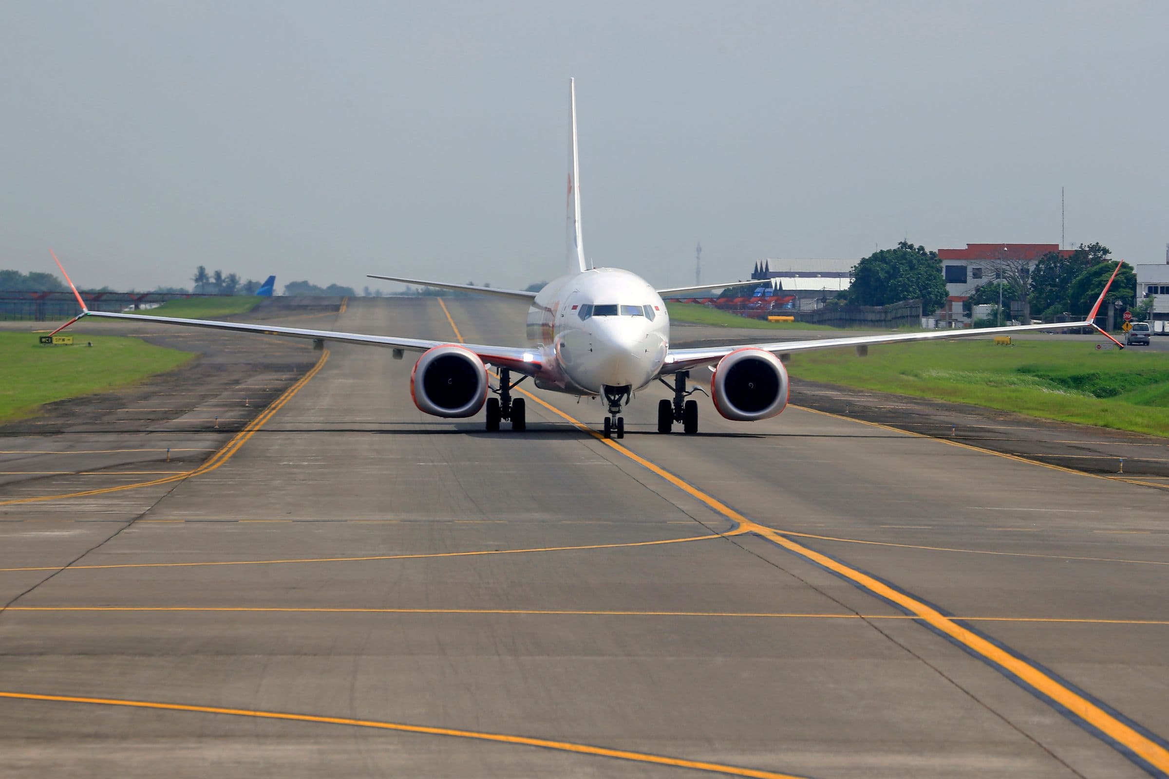 Commercial airplane on an airport runway
