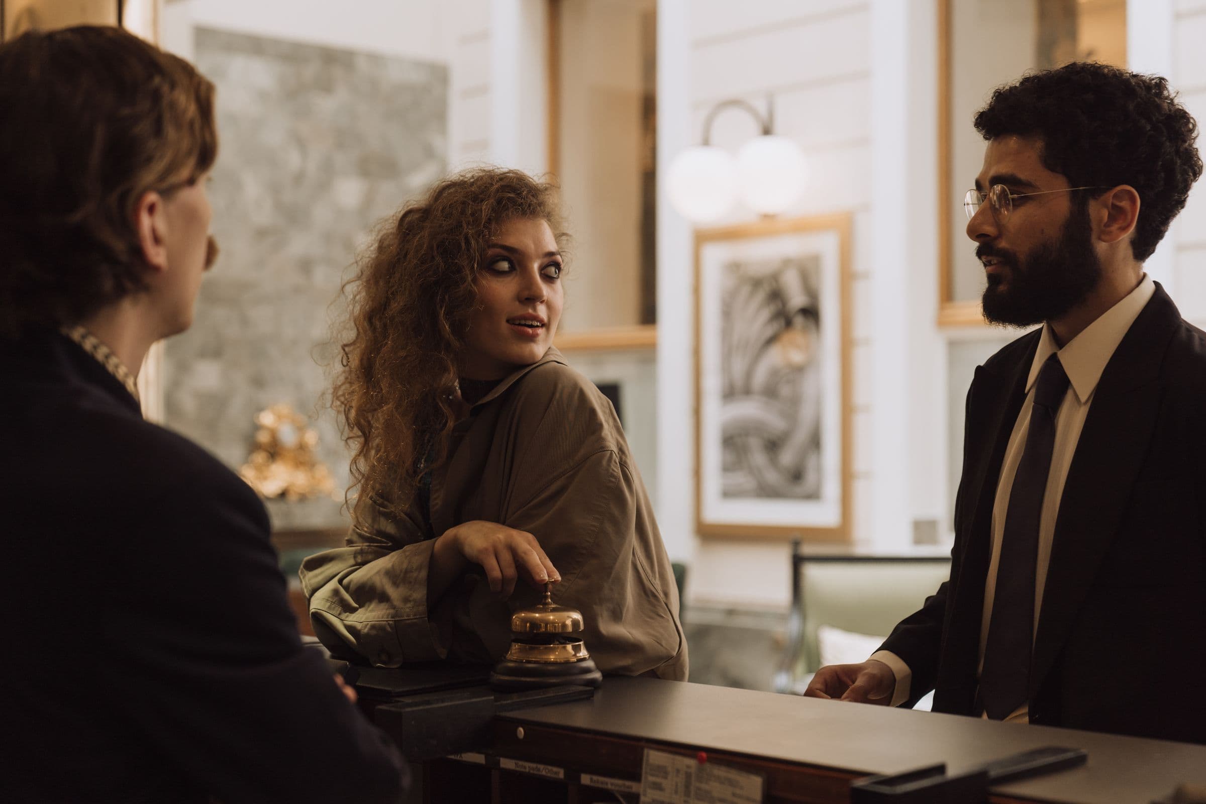 Guest speaking with a hotel concierge
