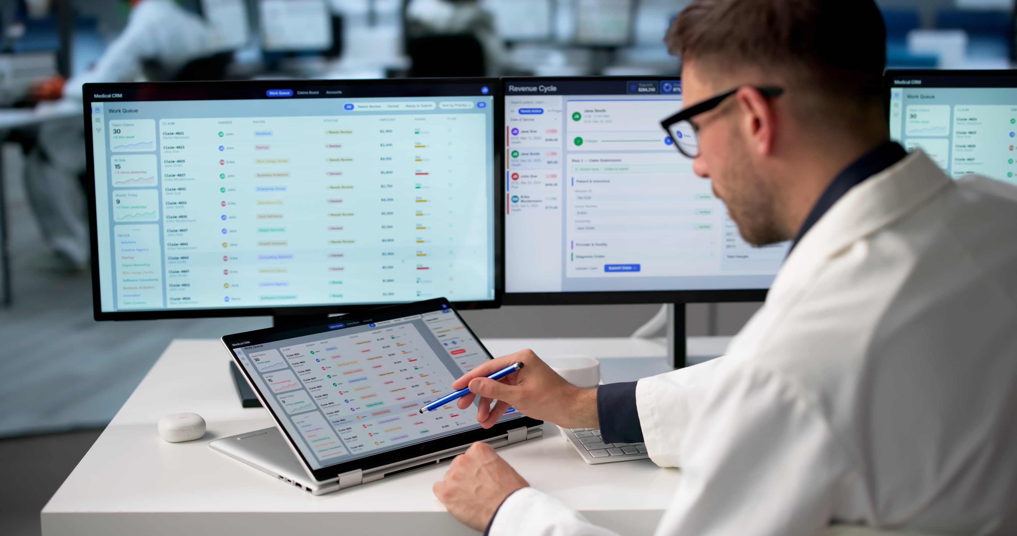 Engineer reviewing code on a laptop
