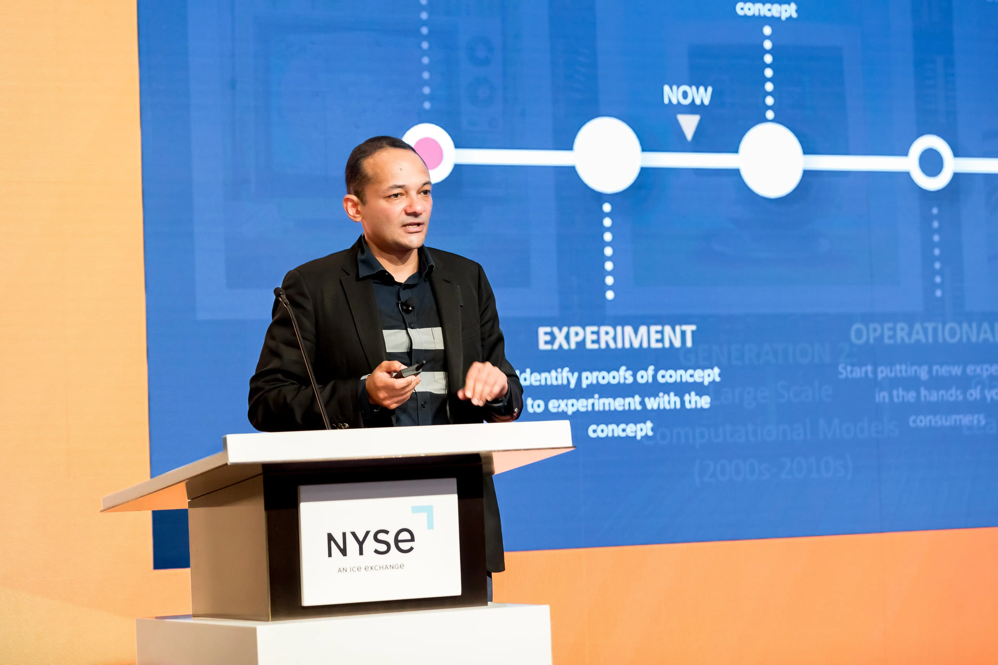 Speaker at an NYSE podium
