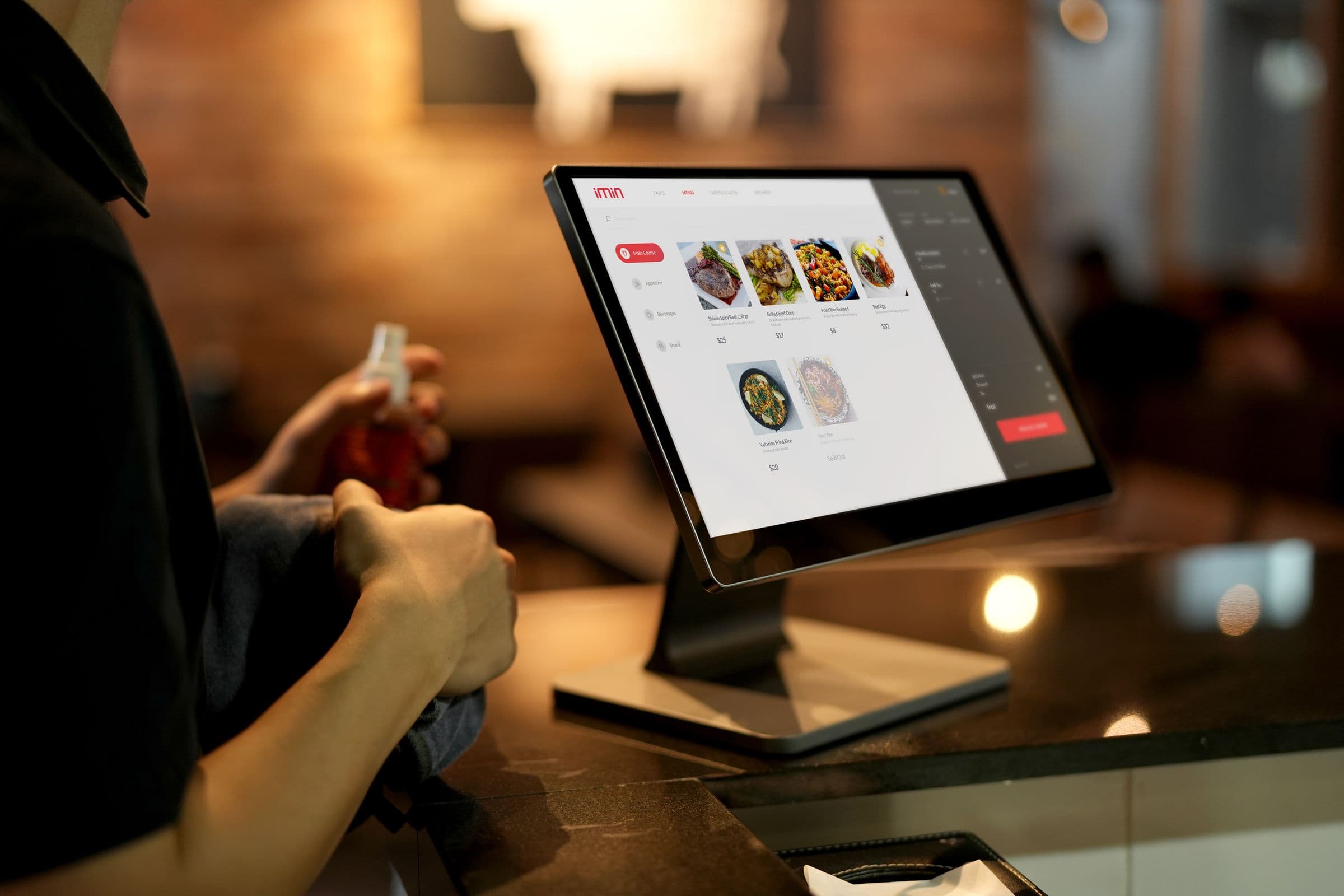 Guest using a restaurant ordering kiosk